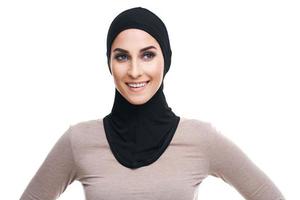 Muslim woman over white background photo