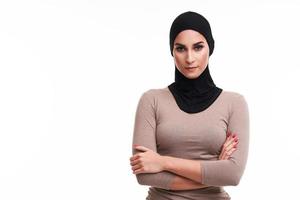 Muslim woman over white background photo