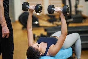 Fit couple at the gym looking very attractive photo