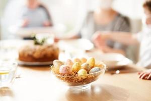 Family at home quarantine over Easter table photo