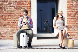 Adult tourists in masks sightseeing Gdansk Poland photo