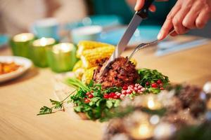 Christmas ham being served on the table photo