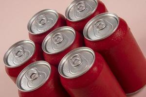 Cold red soda cans for conceptual use photo