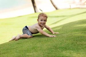 Little boy on vacations at beach photo