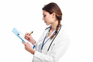 Woman doctor isolated over white background photo