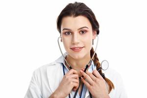 Woman doctor isolated over white background photo