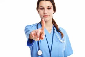 Woman doctor isolated over white background photo