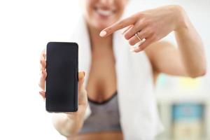 Woman doing fitness exercises at home photo