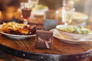 Tasty dishes on table in restaurant photo