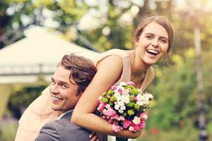 Beautiful wedding couple enjoying wedding photo