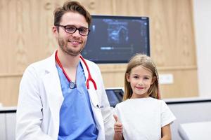 Doctor testing young girl with usg photo