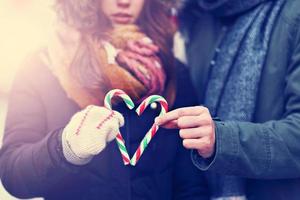 Couple having fun in the winter photo