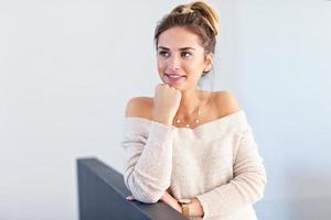 Happy woman posing at home photo