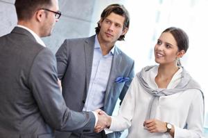 Group of business people introducing one another photo