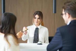 Receptionist working in a hotel photo