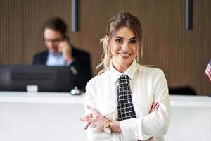 Receptionist working in a hotel photo