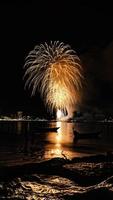 Abstract colored firework background light up the sky with dazzling display photo