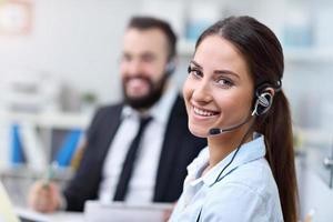 Pretty woman in call center photo