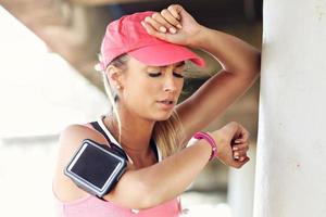 Woman jogging on the beach photo