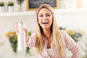 Female florist working in flower shop photo