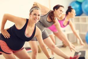 Group of pregnant women during fitness class photo