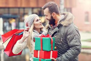 Picture of couple shopping for Christmas in the city photo