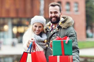 Picture of couple shopping for Christmas in the city photo