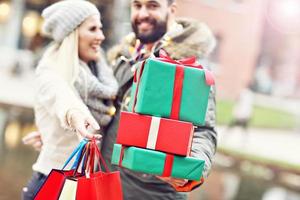Picture of couple shopping for Christmas in the city photo