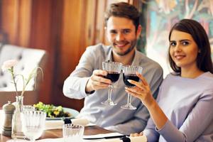 Romantic couple dating in restaurant photo