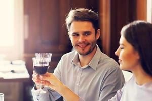 Romantic couple dating in restaurant photo