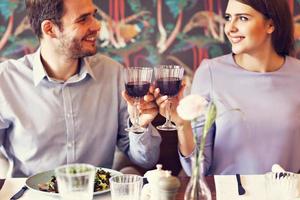 Romantic couple dating in restaurant photo