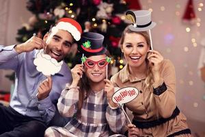 Happy family having fun during Christmas time photo