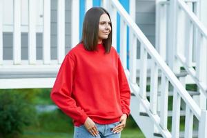 Young woman in red blouse photo