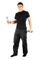 man in black with tools photo
