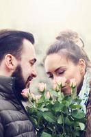 Romantic couple with flowers photo