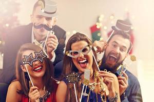 Group of friends celebrating New Year photo