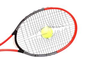 Broken strings in tennis racket photo