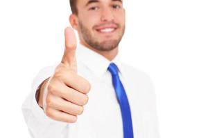 Young businessman showing ok sign photo