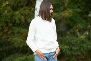 Young woman in white blouse photo