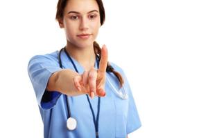 Woman doctor isolated over white background photo