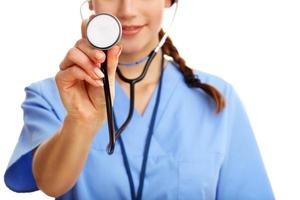 Woman doctor isolated over white background photo