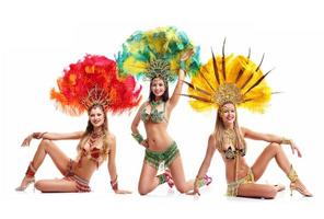 Brazilian women dancing samba over white background photo