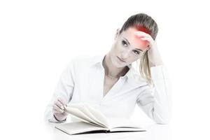 Businesswoman with documents having headache photo