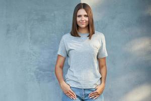 Young woman in gray shirt photo