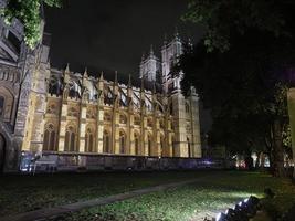 Westminster Abbey church at night in London photo