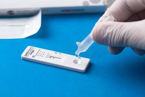 Negative test result by using rapid test device for COVID-19. photo