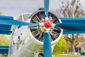 Old airplane background, rotor and engine motor closeup photo