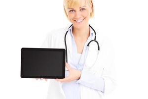 Young doctor with tablet photo