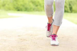 Jogger's legs on the path photo