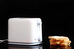 Toasted bread and toaster photo